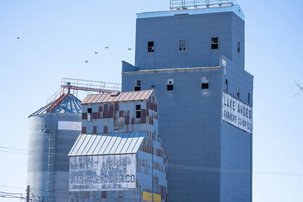 Grain silos and buildings labeled "Lake Andes Farmers Co-op."